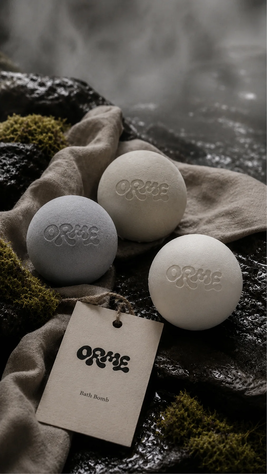ORME bath bombs on wet stone and soft fabric